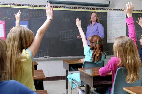 Teacher Asks Questions In Class Stock Photo Dissolve