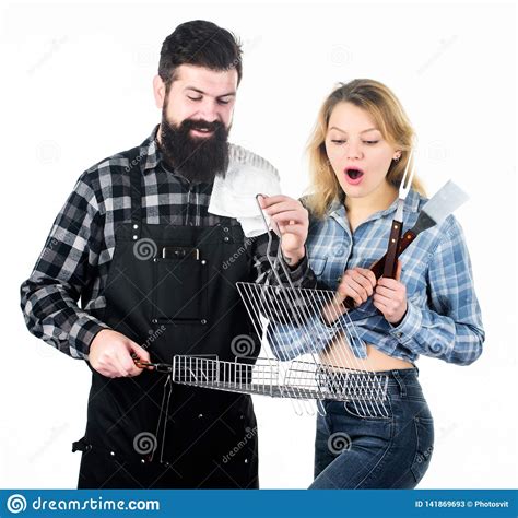 you cant beat our meat bearded man and cute girl holding cooking grid happy couple having