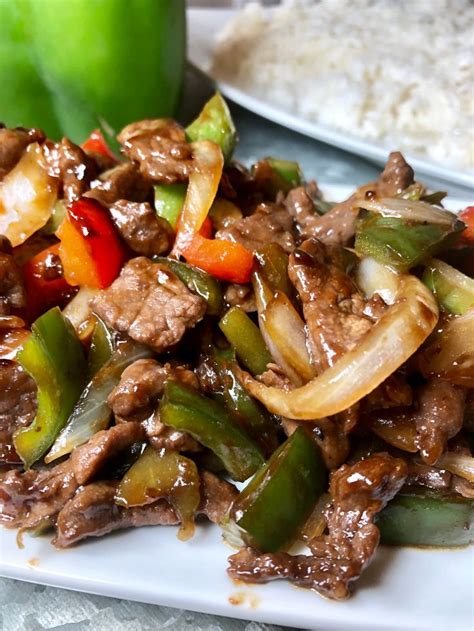 Pepper Steak Is A Tasty Asian Style Dish Served On A Bed Of White Rice