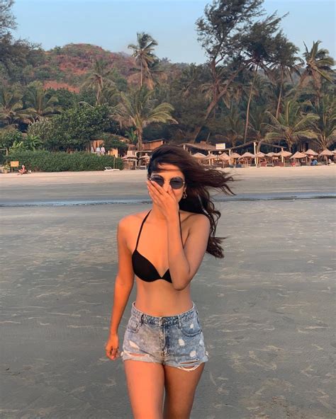 Rhea Chakraborty Wows Fans With Bikini And Denim Shorts On The Beach