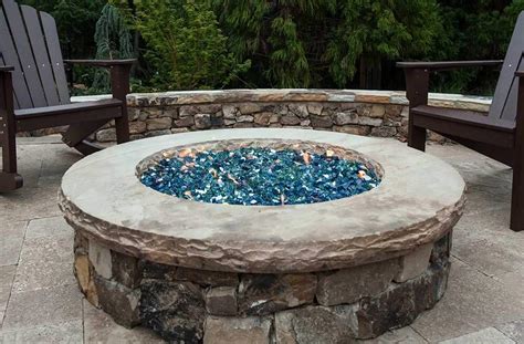 A fire pit provides the perfect focal point for your backyard as well as create a warm cozy atmosphere. Fire Pits - Georgia Pools - South Atlanta Pool Company