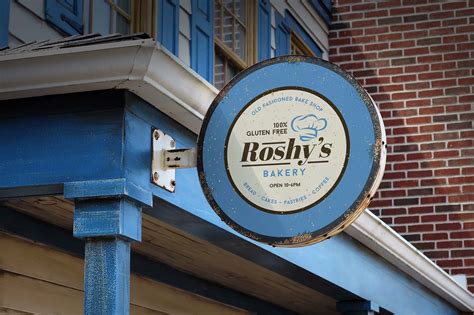 Free Vintage Wall Mounted Sign Board Mockup (PSD)