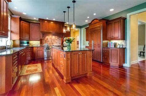 We have bamboo floors and cherry cabinets. Cherry Hardwood Flooring (Popular Types & Design Ideas ...