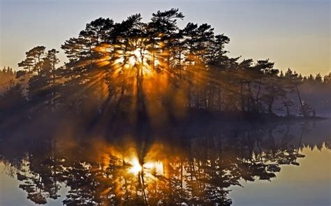 1230x768 Nature Landscape Sunrise Island Reflection Lake Sun Rays