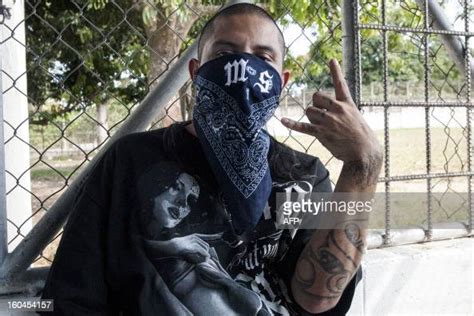 A Mara Salvatrucha Gang Member Attends A Press Conference Where