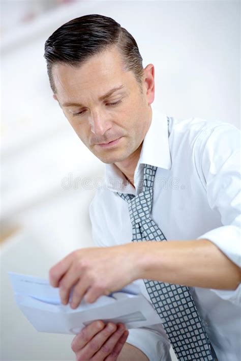 Businessman Opening An Envelope Stock Photo Image Of File Finance