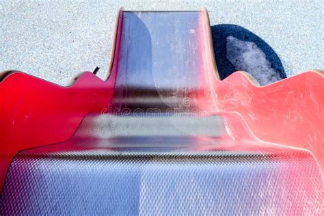 An Empty Dirty And Muddy Red Slide Stock Photo Image Of Park