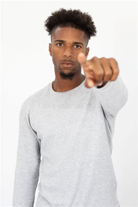 Portrait Of Serious African American Man Pointing At Camera Stock Image