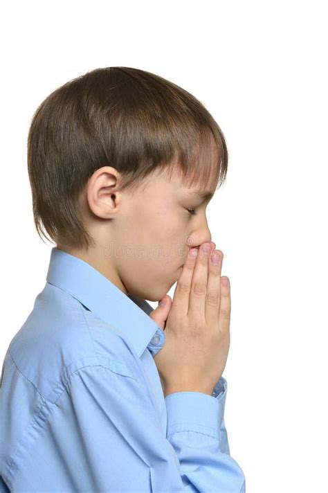 Young Sad Praying Boy Standing Isolated Stock Photo Image Of Casual