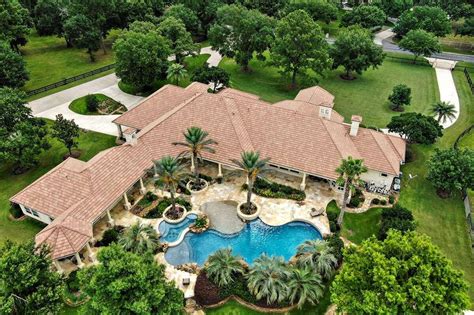Jog Around Your Own Private Lake At This 3m Mediterranean Cypress Home