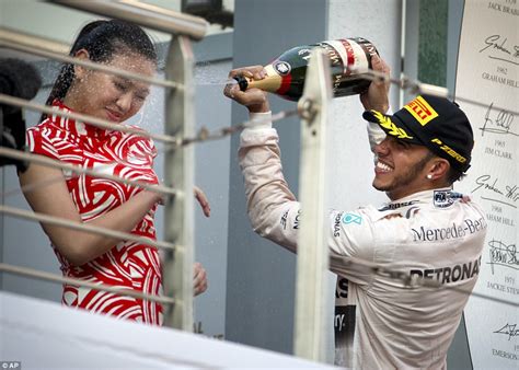 F1s Lewis Hamilton Under Fire For Spraying Hostess At Chinese Grand