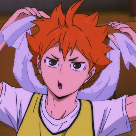 An Anime Character With Red Hair Holding His Hands Behind His Head