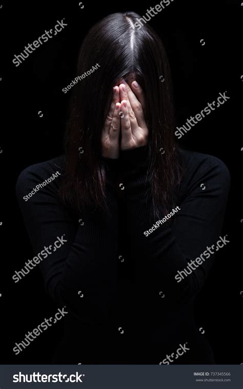 Emotional Woman Crying Covering Face Hands