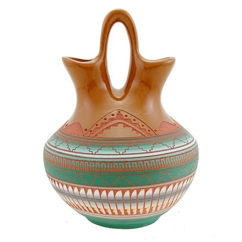 Each fiancé drinks from one side of the vase before they lift the vase red is a common shade for native american wedding dresses, although if the bride's tribe is associated with other colors, then she may choose a. Native American Navajo Wedding Vase By Susie Charlie ...