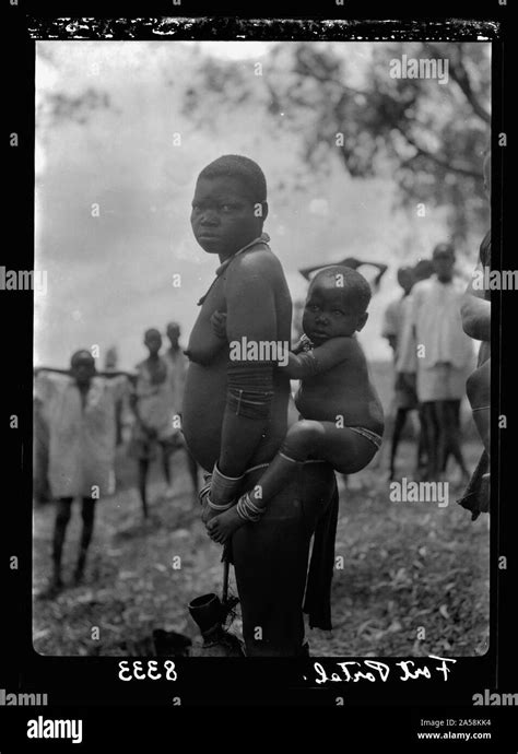 Uganda From Hoima To Fort Portal Woman Carrying Child Stock Photo Alamy