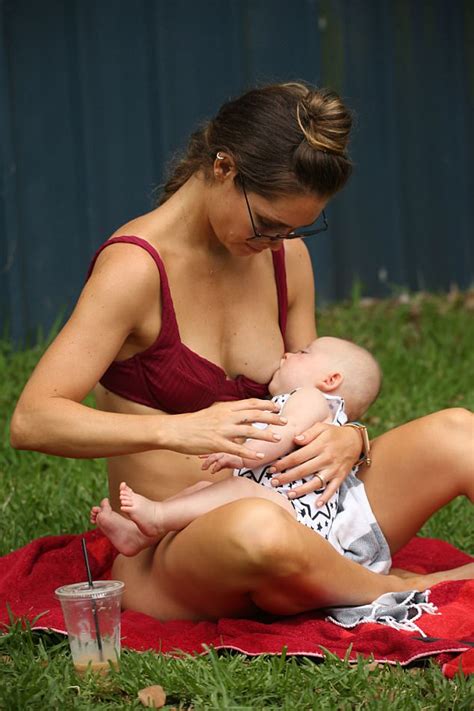 Erin Mcnaught Tans While Breast Feeding At The Pool