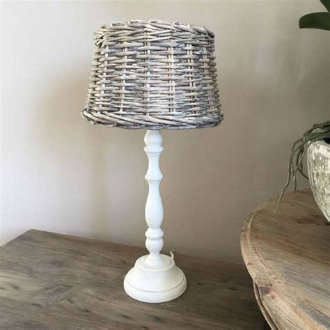 Slight table lamp with neutral shade options. Coastal White Table Lamp And Shade By Cowshed Interiors | notonthehighstreet.com
