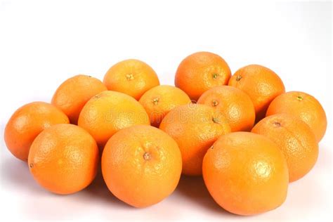 Pile Set Of Oranges Bright Shiny Orange Close Up On A White