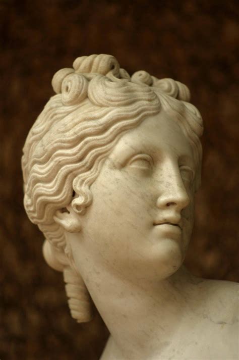 A Close Up Of A Statue Of A Womans Head