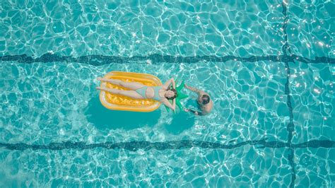 Top View Of People In The Swimming Pool · Free Stock Photo