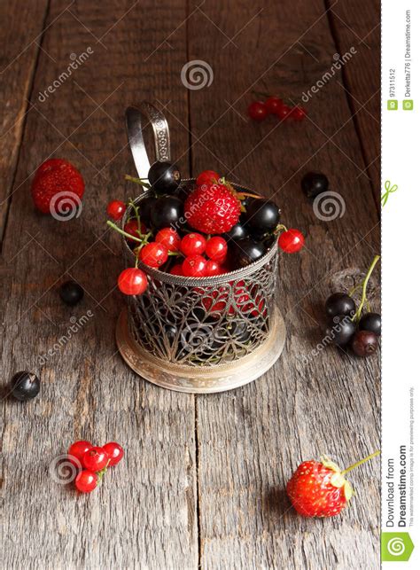 Fresh Berries Various Summer Berries In A Bowl On Rustic Wooden Table