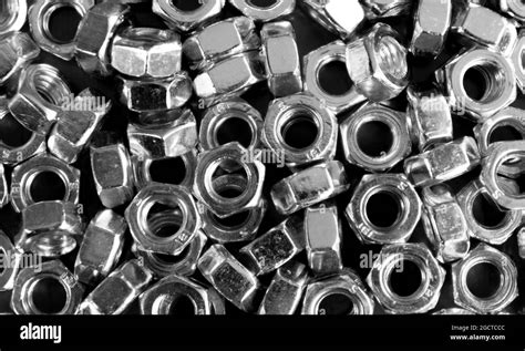 Metal Nuts In A Row Background Chromed Screw Nut Texture Steel Nuts