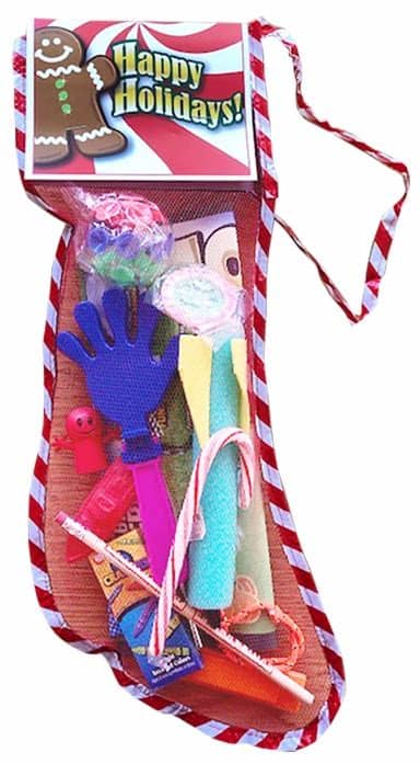 Santa claus toy in christmas stocking. 18 inch Toy and Candy Filled Net Christmas Stocking
