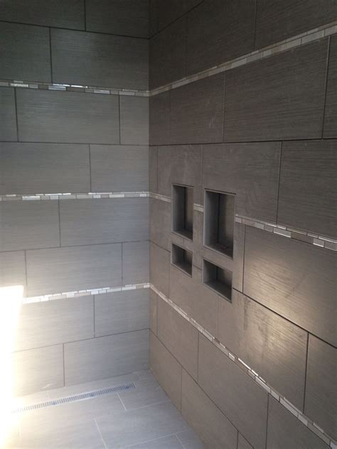 Custom Tiled Shower With 12x24 Tile Installed Horizontally With Glass