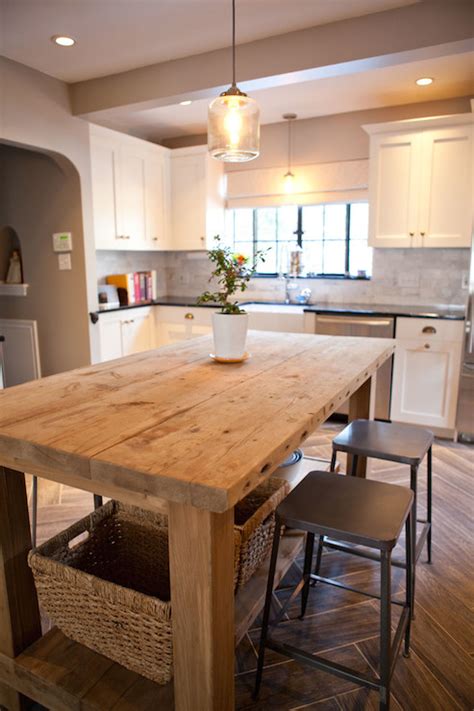 This weekend, kitchens have been on my mind. Salvaged Wood Island - Transitional - kitchen - Tess Fine
