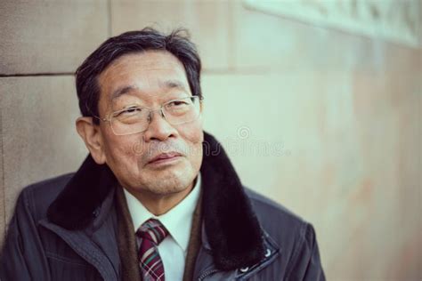Japanese Senior Old Man Outdoors Smiling And Happy Portrait Stock Image