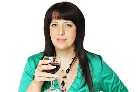 Premium Photo Dark Haired Woman Holding A Glass Of Wine