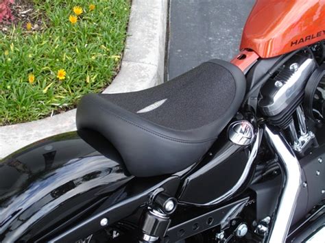 Oh and the person riding it is about 6'2 250 lbs. Custom Solo Seat for the Sportster Forty-Eight