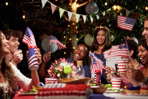 Friends Celebrating 4th Of July Holiday With Backyard Party Stock