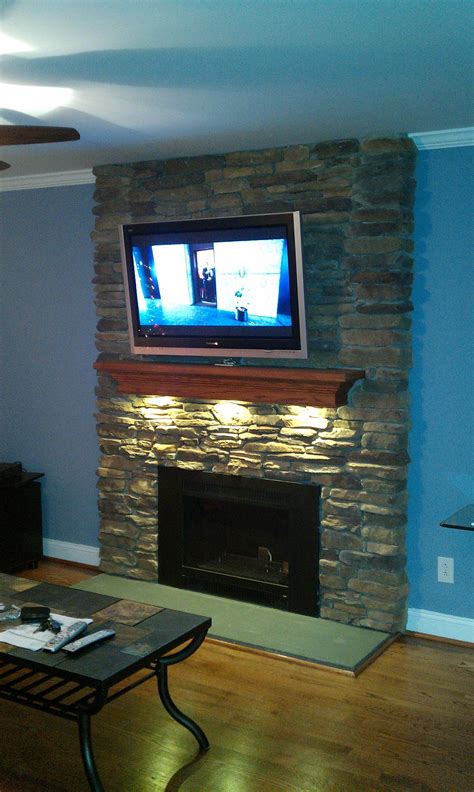 LED puck lights under your fireplace mantel. DIY fireplace mantel. Home
