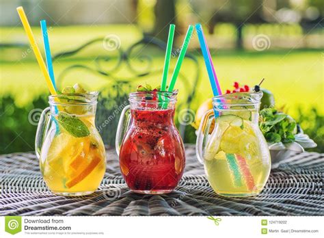 Set Of Three Summer Lemonade With Ice And Fruit Like Lemon Orange