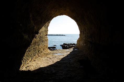 Sunshine Into The Rock Cave In The Cliff On Anzio Beach Rome In Italy
