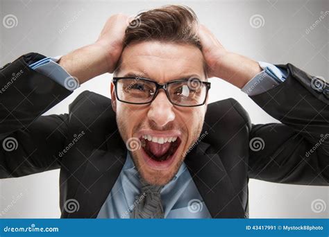 Closeup Portrait Of Angry Frustrated Man Pulling His Hair Out Stock