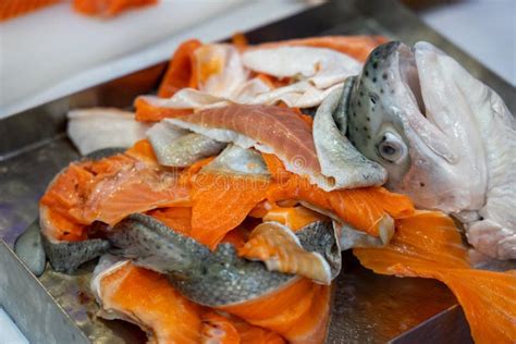 Pieces Of Salmon On Fish Market As A Waste After Preparation Of Some
