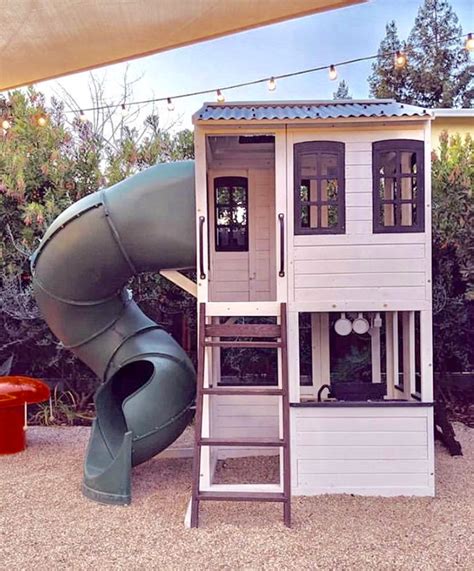 Farmhouse Style Outdoor Playhouse Two Story With Slide In 2020