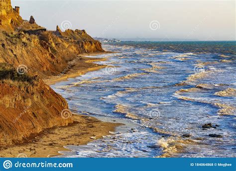 Stormy Sea Coast Colorful Seaside Landscape With Sand Cliffs And Sea