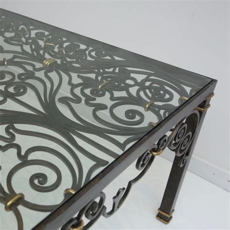Chestnut lychee stump coffee table. Iron Gate Coffee Table For Sale at 1stdibs
