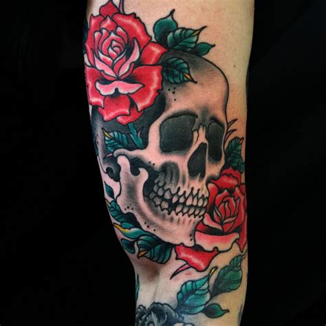 Colorful flower skull tattoo on left upper thigh. Arm Flowers Skull Tattoo - Slave to the Needle