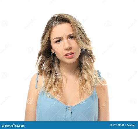 Portrait Of Confused Young Woman On White Background Stock Photo