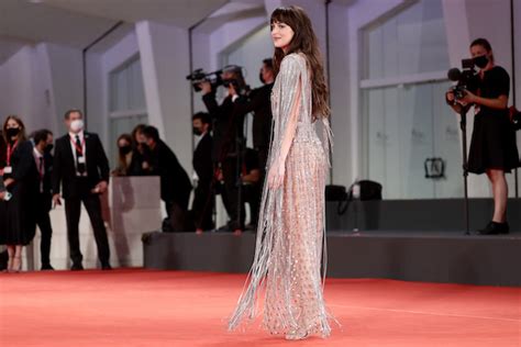 Dakota Johnson Wows On Red Carpet In Jaw Dropping Sheer Fringed Silver Gown In Venice The