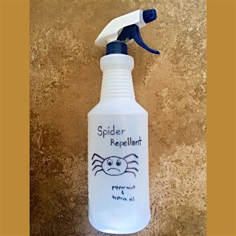 A Spray Bottle With Spider Repellent On It