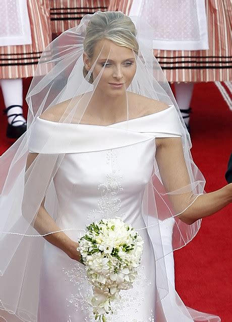 The princess wore only an embroidered headpiece on her wedding day with jewelry. Celebrities' Wedding Dresses: Charlene Wittstock Royal ...