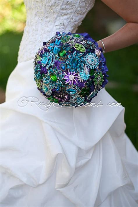 Gorgeous faux roses in a midnight black flower color. Gold Black And Green Peacock Wedding Brooch Bouquet ...