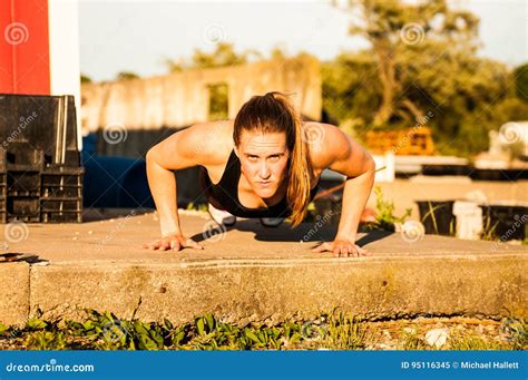 front view of woman doing pushups outside stock image image of athlete working 95116345