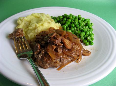 Serve salisbury steak patties over mashed potatoes. Robyn Cooks: Salisbury Steak