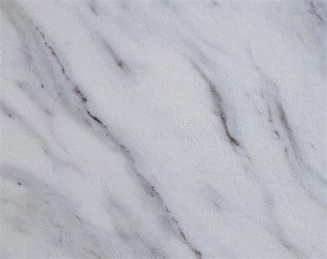 White Marble With Brown And Black Veins Polished Surface Of Natural